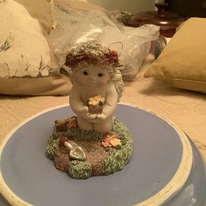 Dream sickle angel stone statue